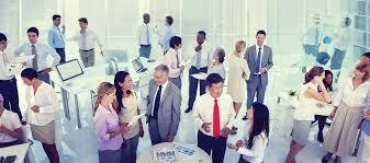 Professionals networking at an industry association event for career growth